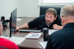 Engineer Explaining Conveyor Belt Topics